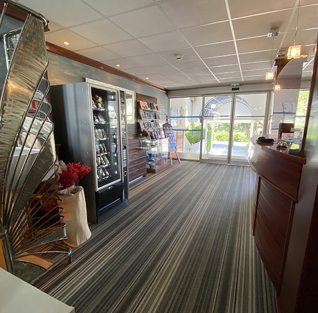 Breakfast buffet with coffee machine and fresh fruit